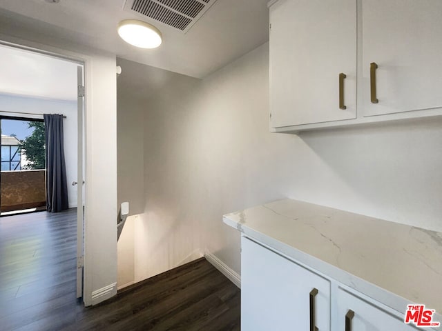 washroom featuring dark hardwood / wood-style flooring