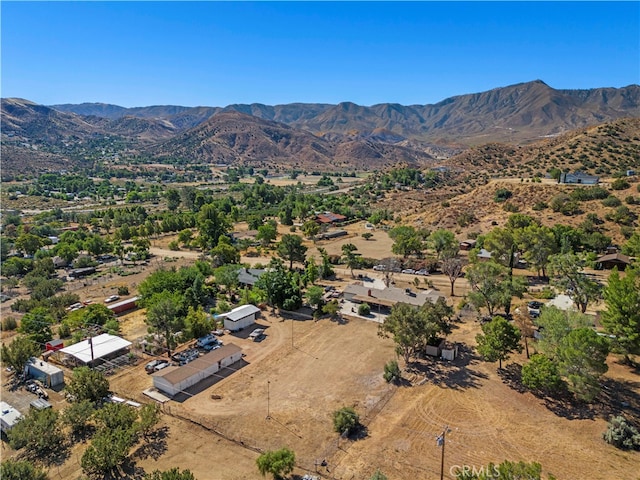 bird's eye view with a mountain view