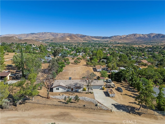 drone / aerial view featuring a mountain view