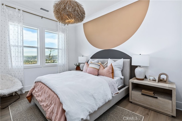 bedroom with light wood-type flooring