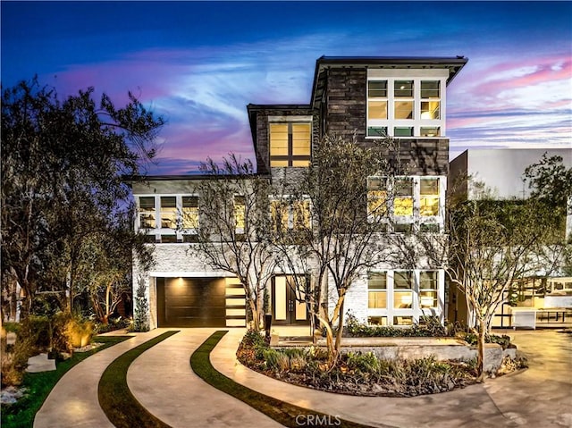 contemporary home with a garage