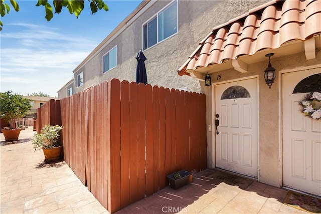 888 Victor Ave Unit 15, Inglewood, CA 90302 - view of exterior entry with fence and stucco siding