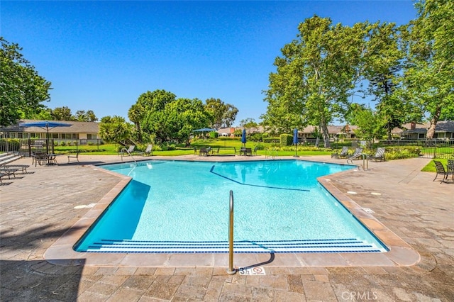 view of pool with a patio area