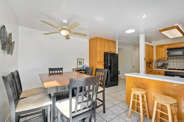 569 Prado Verde, San Marcos, CA 92069 - tiled dining room featuring ceiling fan