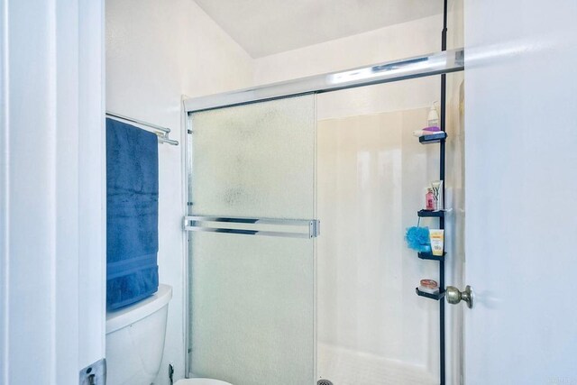 569 Prado Verde, San Marcos, CA 92069 - bathroom with toilet and a shower with door