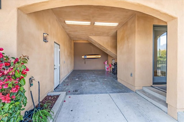 entrance to property featuring a patio