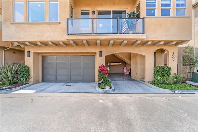 view of front of property with a garage