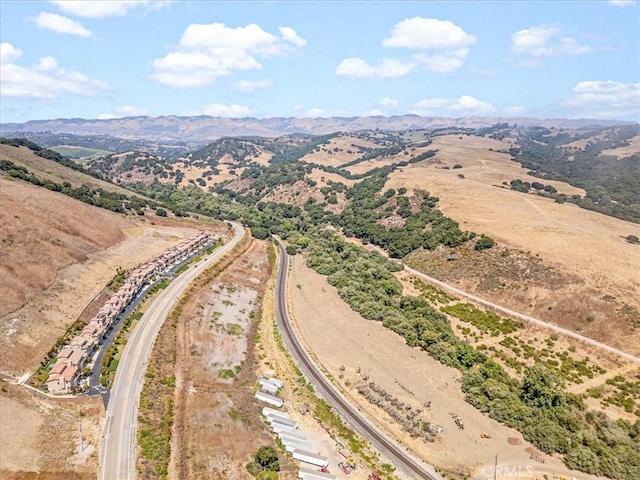 drone / aerial view featuring a mountain view