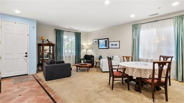 dining room featuring recessed lighting, visible vents, and light tile patterned floors