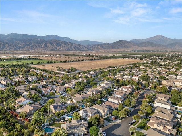 bird's eye view with a residential view and a mountain view