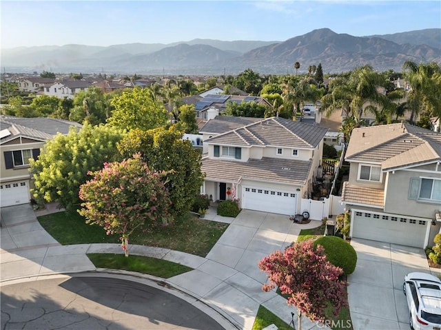 drone / aerial view featuring a mountain view and a residential view