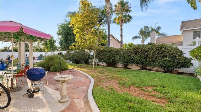 view of yard with a patio area and fence