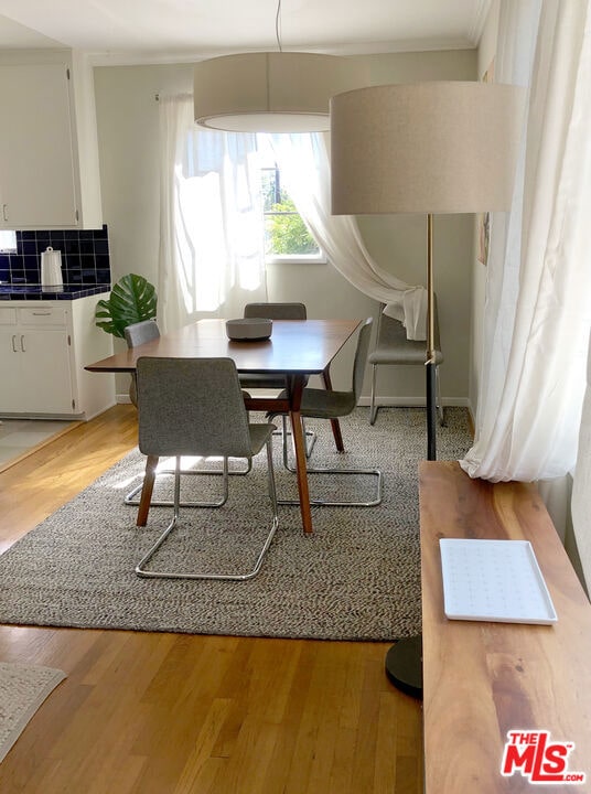 dining room featuring light wood-type flooring