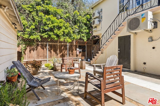 view of patio / terrace featuring ac unit