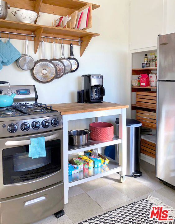 kitchen with white cabinets and stainless steel appliances