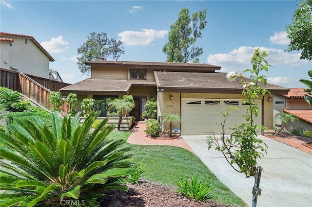 view of front of property featuring a garage