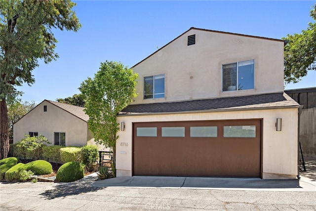 view of front of home with a garage