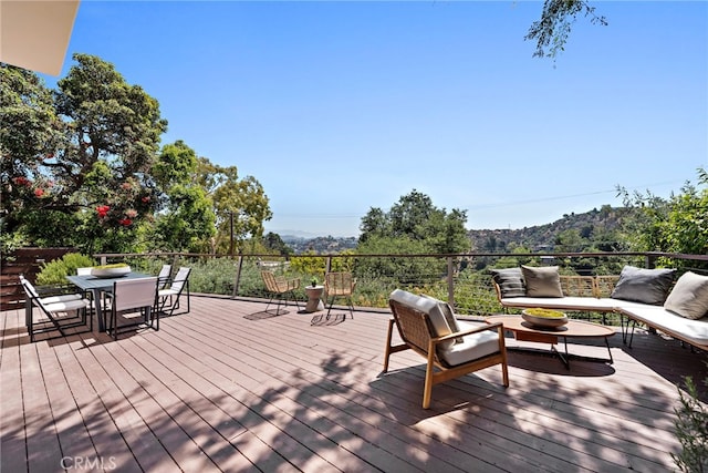 deck with an outdoor hangout area