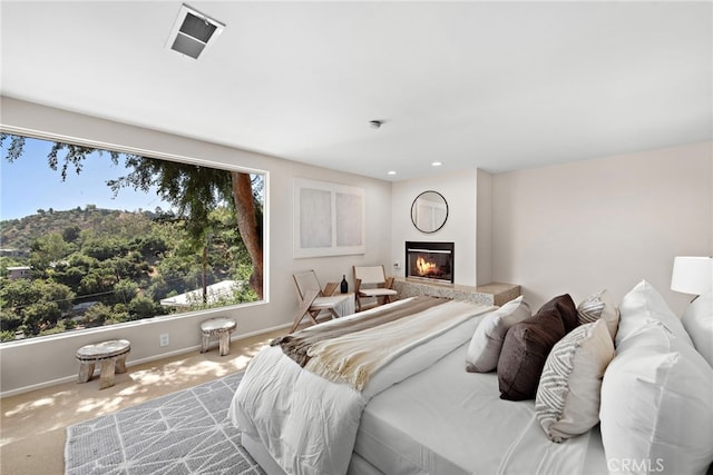 bedroom featuring light colored carpet