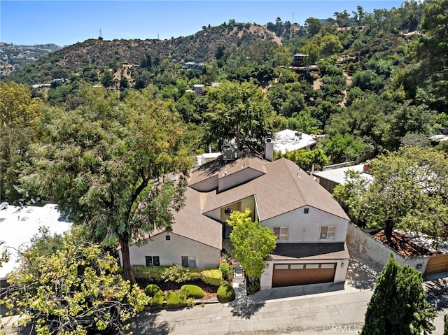 drone / aerial view featuring a mountain view