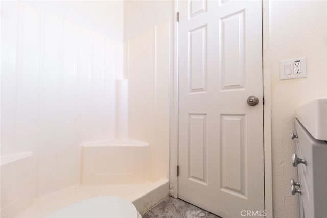 bathroom featuring a shower