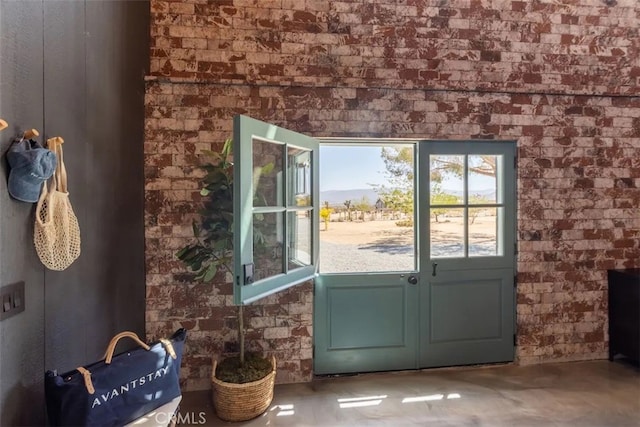 doorway featuring concrete flooring