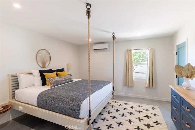 bedroom featuring a wall unit AC