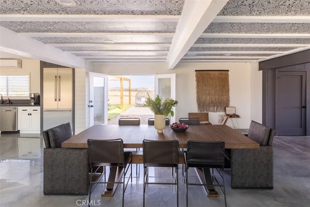 dining space featuring an AC wall unit and beamed ceiling