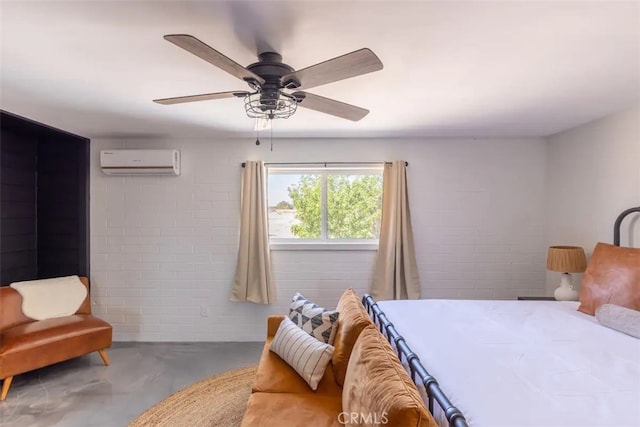 bedroom featuring ceiling fan, a wall mounted AC, and concrete floors