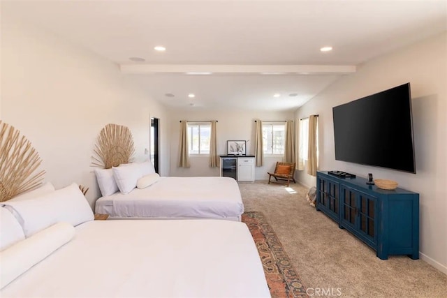 bedroom with lofted ceiling with beams and light carpet