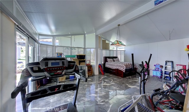 bedroom with lofted ceiling with beams