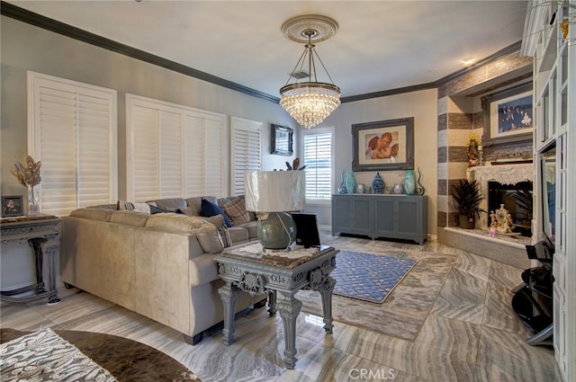 living room featuring ornamental molding and a chandelier