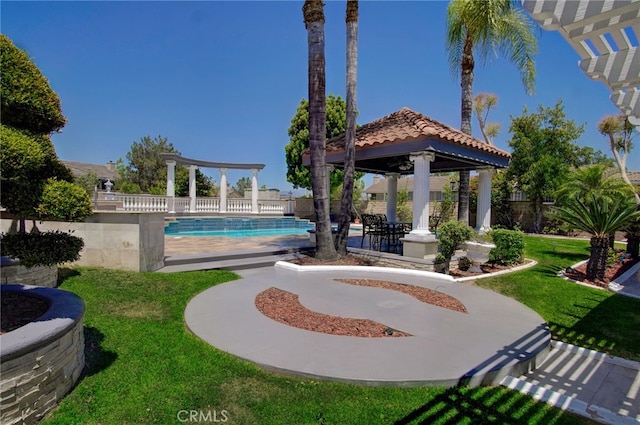 view of swimming pool featuring a gazebo, a yard, and a patio area