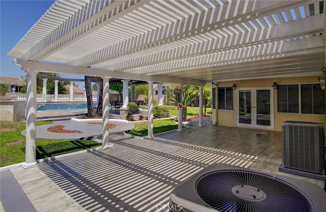 view of patio with a pergola, central AC unit, and french doors