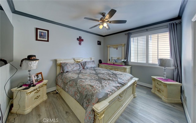 bedroom with crown molding, ceiling fan, and light hardwood / wood-style flooring