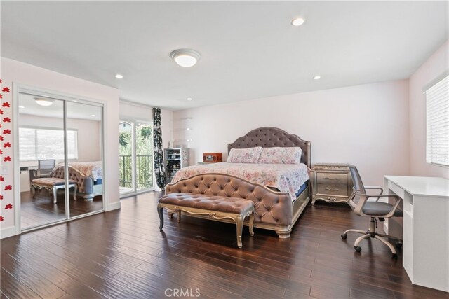 bedroom featuring access to outside and dark wood-type flooring