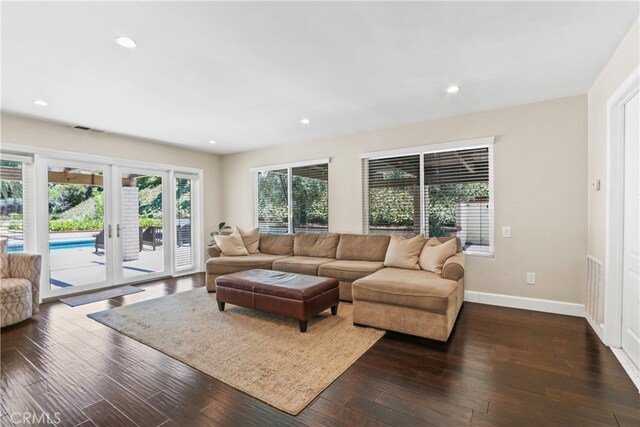 living room with dark wood-type flooring