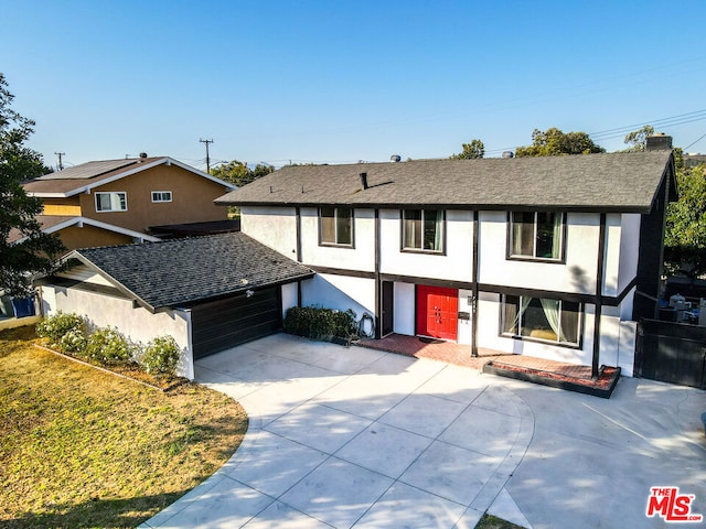 view of front of property with a garage