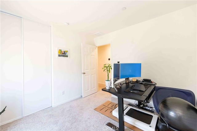 office space with light colored carpet