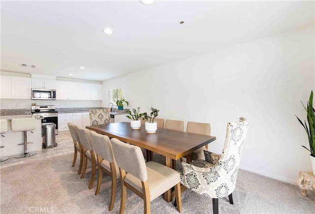 view of carpeted dining room