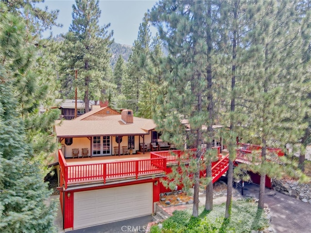 view of front facade featuring a wooden deck