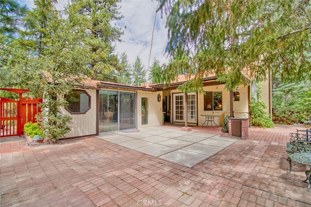 back of house featuring a patio area