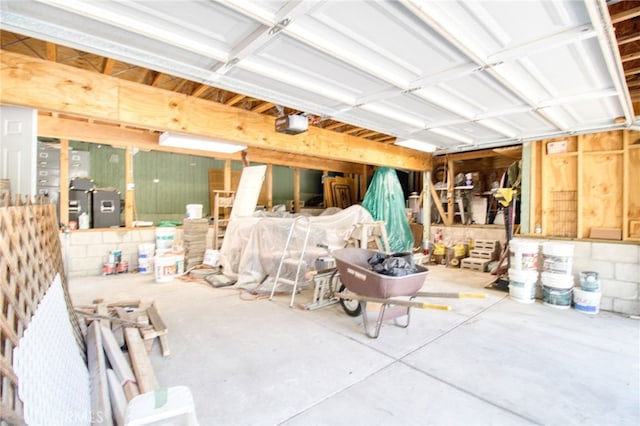 garage featuring a garage door opener