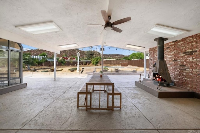 view of patio / terrace featuring ceiling fan