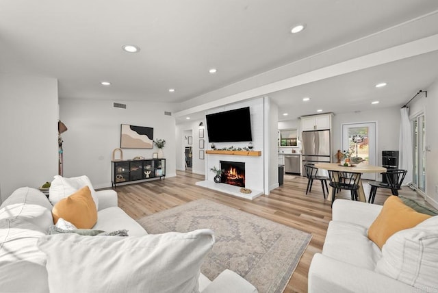 living room featuring light hardwood / wood-style flooring