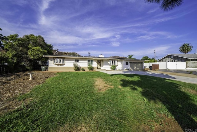 single story home with a front yard and a garage