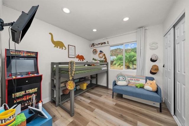 bedroom featuring a closet and hardwood / wood-style floors