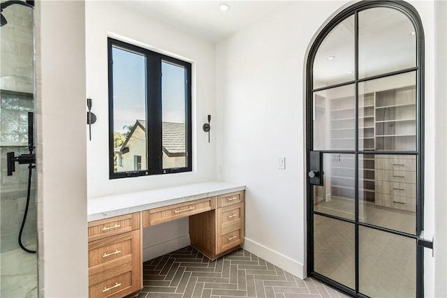 bathroom with vanity and walk in shower