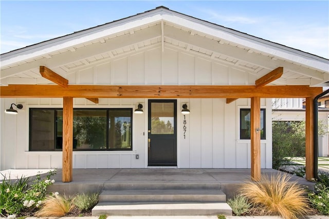 entrance to property with a porch