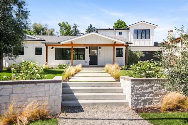 modern farmhouse with a porch